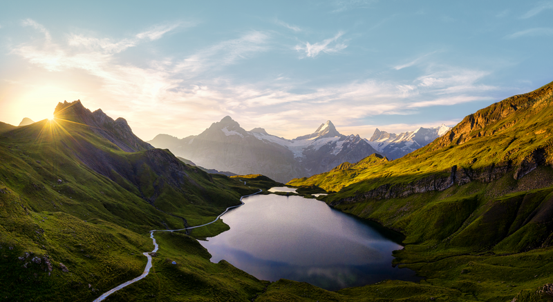 Aerial view of Bachalpsee lake lit by sunrise in summer, Grindelwald, Bernese Oberland, Bern Canton, Switzerland